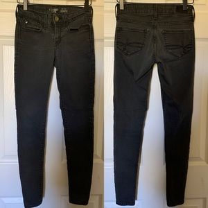 DENIZEN, LEVI’S, low rise black jeggings.